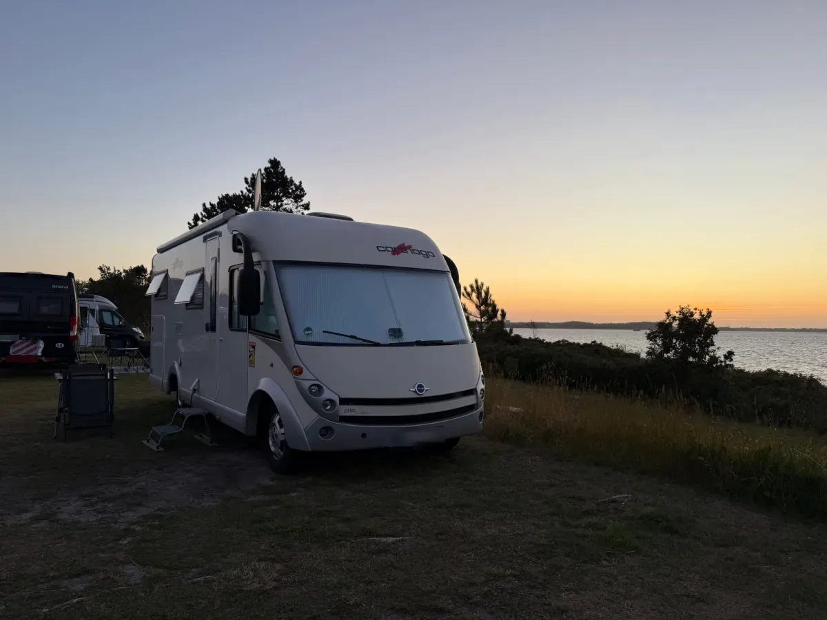Motorhome on a panorama pitch at sunset with the Limfjord on the right